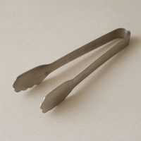 Pinza para servir de acero